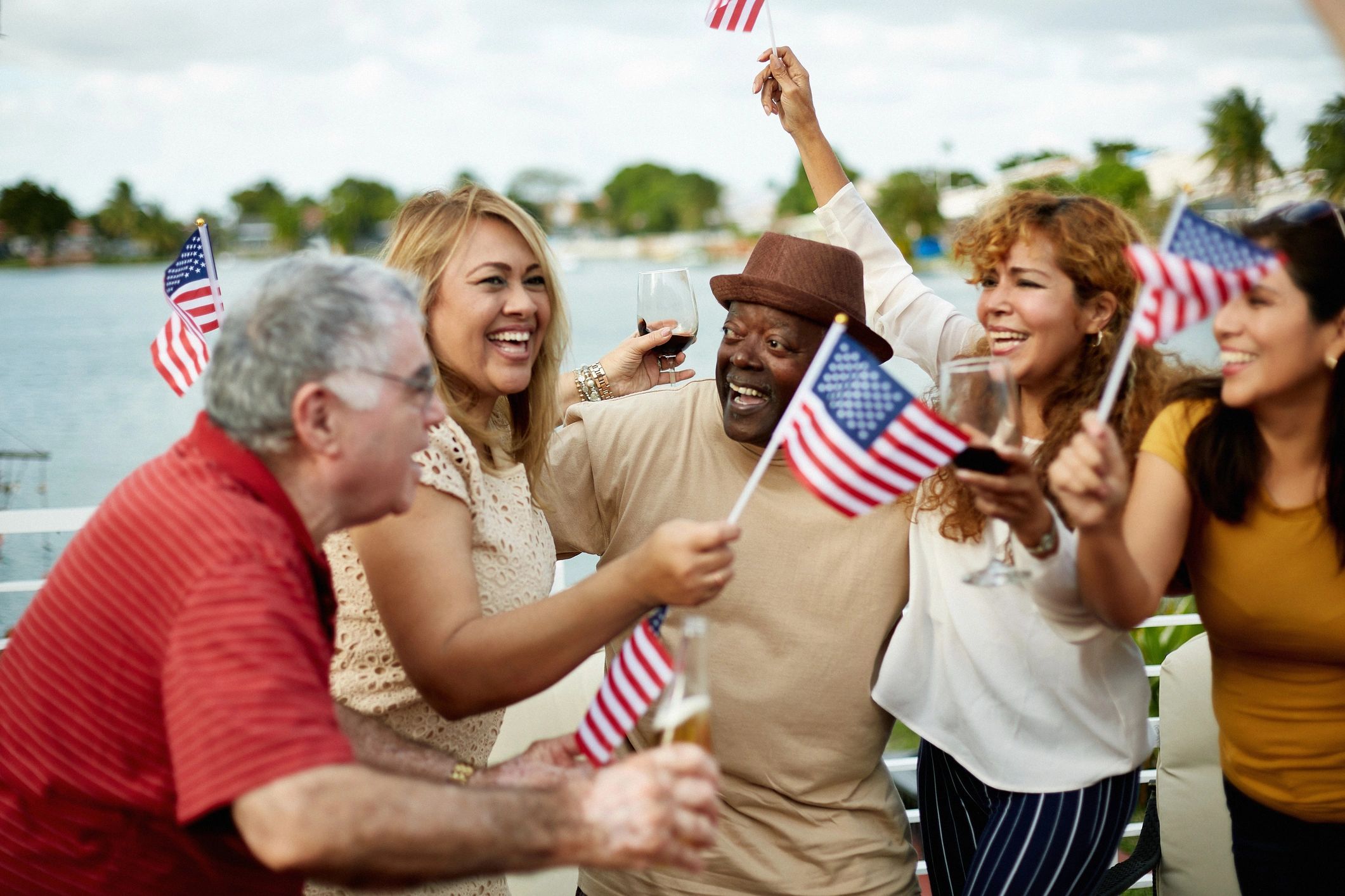 Floridians waving American flags at a community celebration
